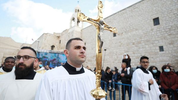Рождество: фотографии празднеств в Вифлееме и мессы в Ватикане