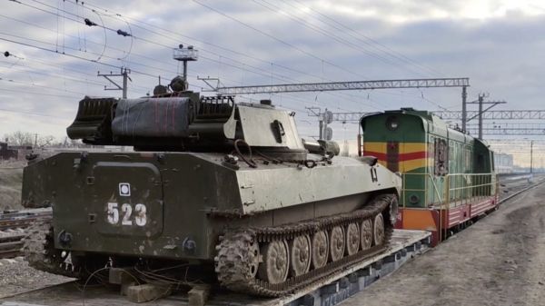 Кризис вокруг Украины: Путин встретился с канцлером Германии Шольцем; российские войска возвращаются с учений в Крыму